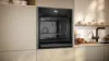 Neff B54CR31G0B 60cm Built In Single Electric Oven with Slide & Hide®